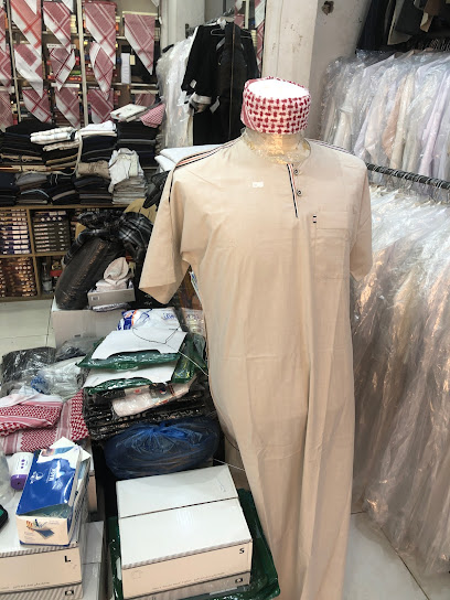 محل ابو عبدالله لبيع وخياطة الملابس الجاهزه - Ar Rass 58851،
