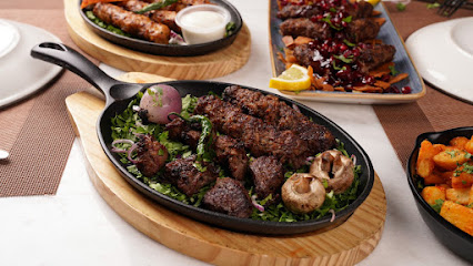 Qurnfel Lebanese Restaurant - Al Madinah Al Munawwarah - +966 14 822 2266