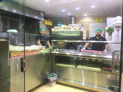 فلافل التفاحه ومشويات ( ابو وديع ) ومعلمين سوريين - Alhada - +966 50 271 6870