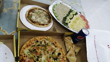 Pizza reef - Yanbu - +966 50 664 6900