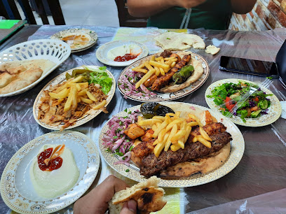 مطعم مشاوي صقر منيف - Jazan - +966 53 464 3230